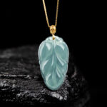 High-grade natural A-grade jadeite blue water leaf pendant 18K gold buckle ice type