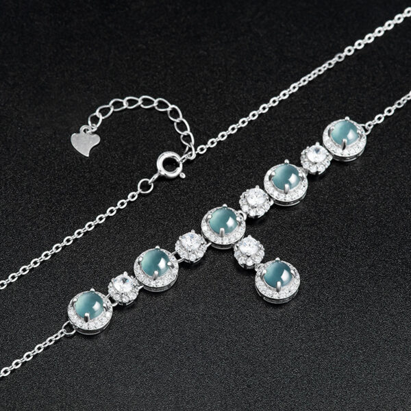 High-grade natural A-grade jadeite blue egg-shaped pendant S925 silver inlaid with ice jade female fashion pendant necklace